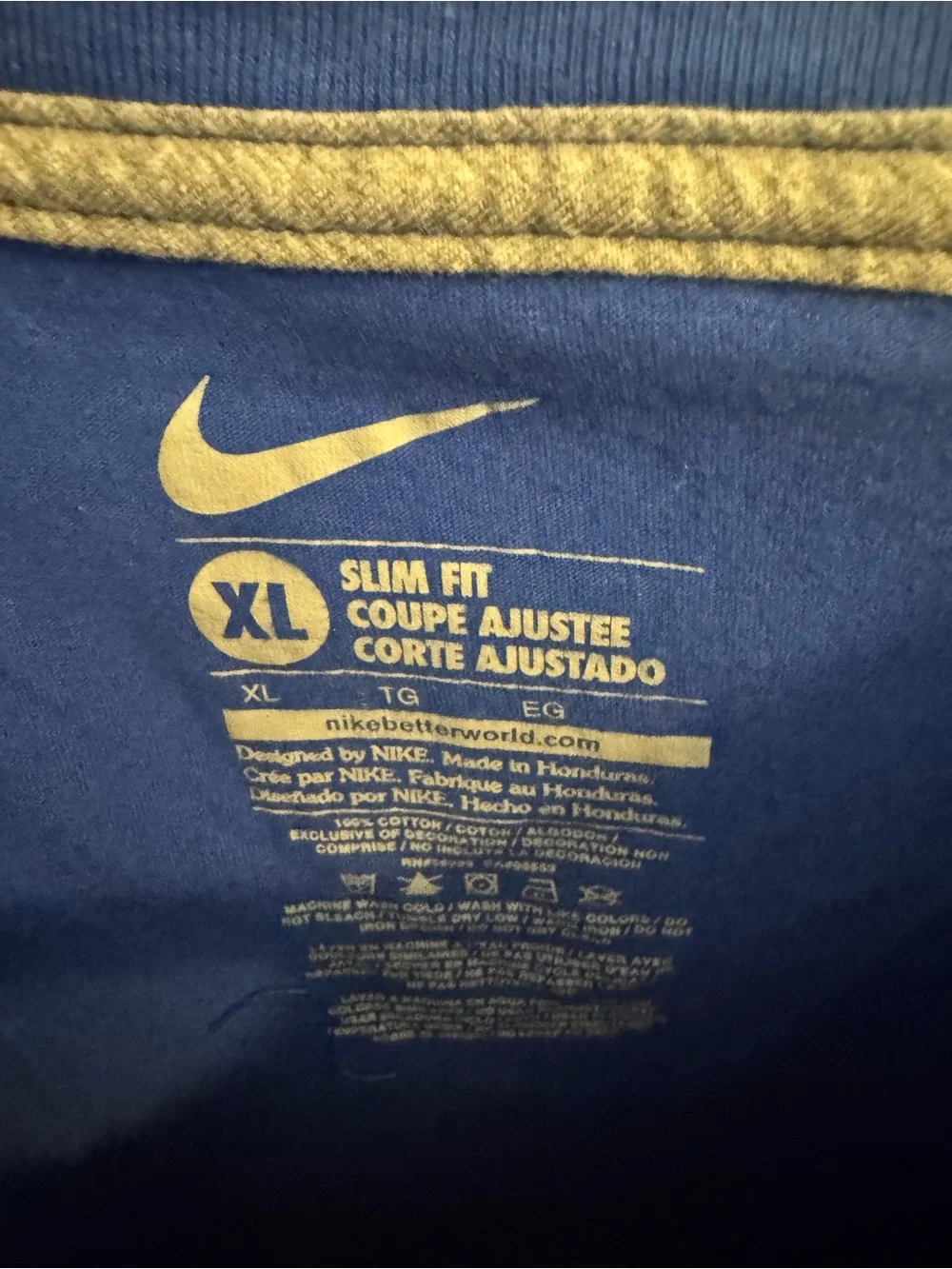 Nike Women's Royal Blue V-Neck Tee with White Patterned Swoosh